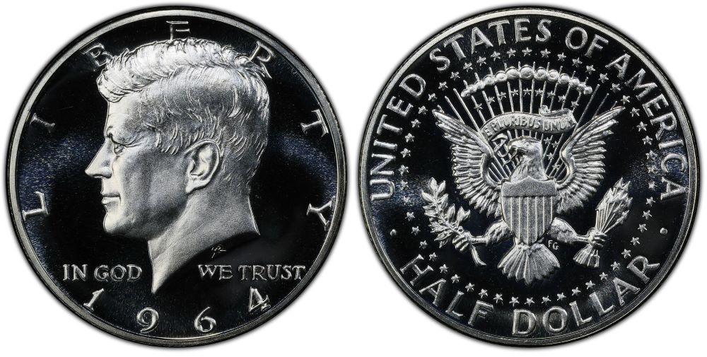 1964 Kennedy Half Dollar proof showing Deep Cameo designation with heavily frosted portrait against deeply mirrored black background fields — worth up to $3,750 in PR69 DCAM